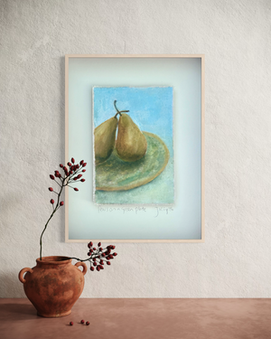 Pear on a Green Plate